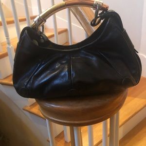 Yves St Laurent black leather handbag
